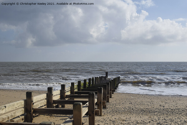 Cloudy skies over Gorleston beach Picture Board by Christopher Keeley