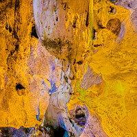 Buy canvas prints of A gnome below a stalactite by Hanif Setiawan