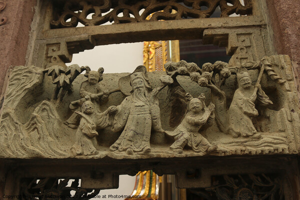 Buddhist bas-relief with sculptures of a family. Picture Board by Hanif Setiawan