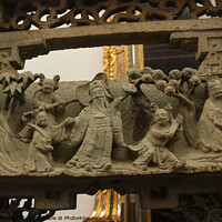 Buy canvas prints of Buddhist bas-relief with sculptures of a family. by Hanif Setiawan