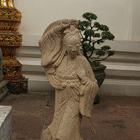 Buy canvas prints of Stone sculptor art from an Asian woman. by Hanif Setiawan