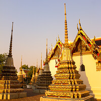 Buy canvas prints of A group of small stupa at Phra Chedi Rai Buddha te by Hanif Setiawan