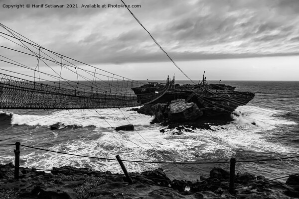 Swinging rope foot bridge to a rock island Picture Board by Hanif Setiawan
