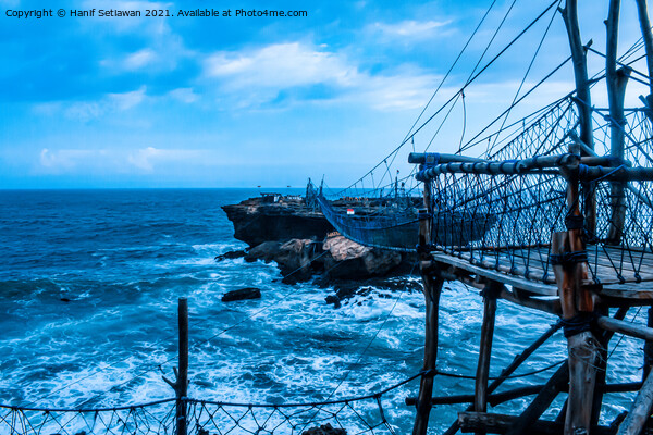 Swinging rope foot bridge to a rock island Picture Board by Hanif Setiawan