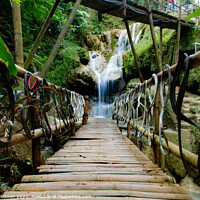 Buy canvas prints of Bamboo bridge to Mudal waterfall by Hanif Setiawan