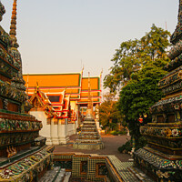 Buy canvas prints of Third sidewalk view of Chedis at Wat Pho. by Hanif Setiawan