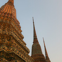 Buy canvas prints of First from three stupa in a row at Wat Pho by Hanif Setiawan
