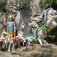 Buy canvas prints of Hindu God with horse carriage at Ramayana Cave by Hanif Setiawan