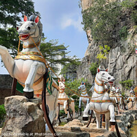Buy canvas prints of Hindu statue on horse carriage at Ramayana Cave by Hanif Setiawan