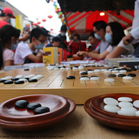 Buy canvas prints of Chinese playing Go Game, Weiqi in a street. by Hanif Setiawan