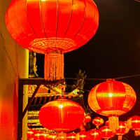 Buy canvas prints of Red lantern as street lights hanging at a wall for Chinese New Year by Hanif Setiawan