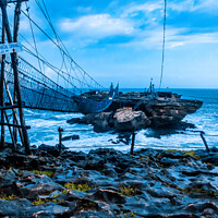 Buy canvas prints of Rock island connected by rope foot bridge by Hanif Setiawan