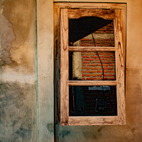 Buy canvas prints of A wooden window on yellow brown wall. by Hanif Setiawan