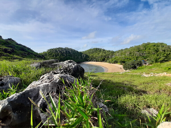 Lagoon sand beach Kasap with green hills. Picture Board by Hanif Setiawan