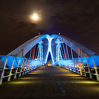 Buy canvas prints of Nightscape of the Millenium bridge at Media City i by Kris Gleave