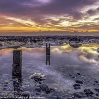 Buy canvas prints of Kingsdown sunrise reflections  by James Eastwell