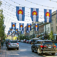 Buy canvas prints of Colorado Flags in historic Larimer Square in downtown Denver. by Mikhail Pogosov