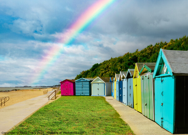 Beach huts and rainbow at Holland-on-Sea Picture Board by Paula Tracy