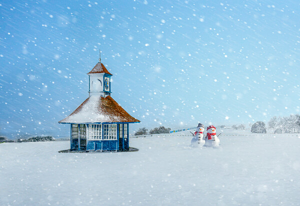 Snowy day at Frinton with cute snowmen Picture Board by Paula Tracy