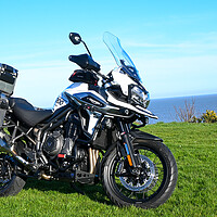 Buy canvas prints of Triumph Tiger 1200 Motorbike by the sea by Paula Tracy