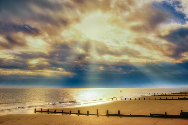 Stunning sun rays lighting up Frinton beach Picture Board by Paula Tracy