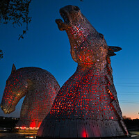 Buy canvas prints of The Kelpies At Night in Red by claire chown