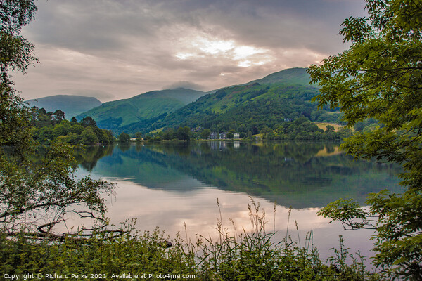 Reflections at Grasmere in the Lake District Picture Board by Richard Perks