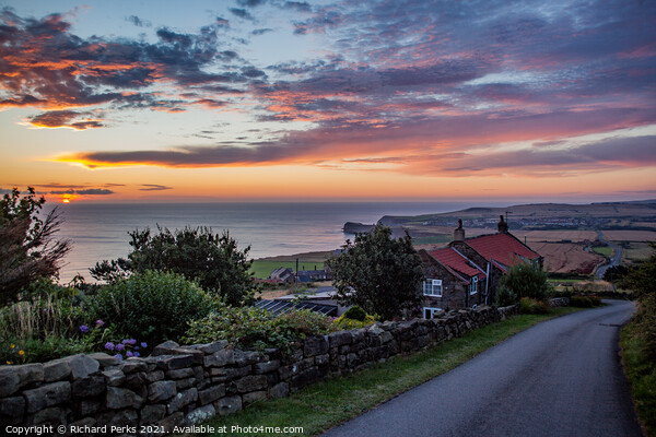 Sunrise Over Staithes coastline Picture Board by Richard Perks