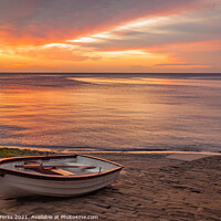 Buy canvas prints of Fishing boat on the cobbles at Robin Hoods bay by Richard Perks