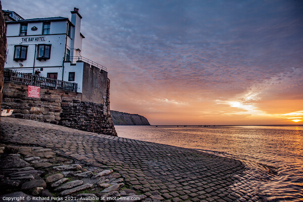 The Majestic Sunrise over Robin Hoods Bay Picture Board by Richard Perks