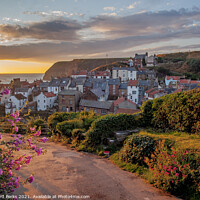 Buy canvas prints of Early morning glow in Staithes by Richard Perks