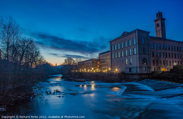 Salts Mill and the River Aire at dawn Picture Board by Richard Perks