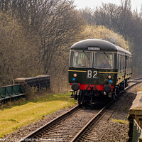 Buy canvas prints of Heritage Diesel approaching Burrs Country Park by Richard Perks