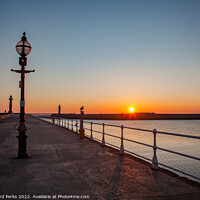 Buy canvas prints of Sunrise on Whitby Pier by Richard Perks