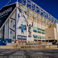Buy canvas prints of The Iconic Billy Bremner Statue at Leeds United St by Richard Perks