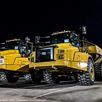 Buy canvas prints of Caterpillar machines in the night by Richard Perks