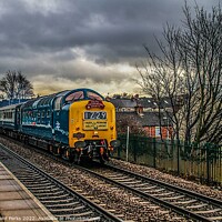 Buy canvas prints of Preserved Deltic locomotive under storm clouds by Richard Perks