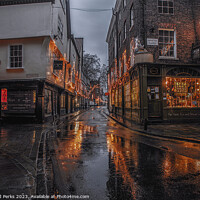 Buy canvas prints of Rainy reflections in the streets of York by Richard Perks