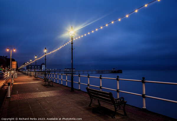 Evening lights on Penarth Promenade Picture Board by Richard Perks