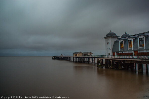 Dramatic Storm Clouds Engulf Penarth Pier Picture Board by Richard Perks
