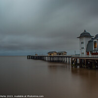 Buy canvas prints of Dramatic Storm Clouds Engulf Penarth Pier by Richard Perks