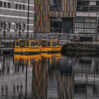 Buy canvas prints of Leeds Taxi Boats Reflections by Richard Perks
