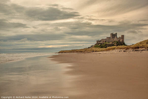 Storm Clouds over Bamburgh Castle Picture Board by Richard Perks