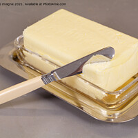 Buy canvas prints of Pack of butter in a butter dish by aurélie le moigne