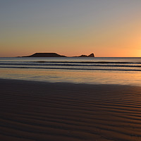 Buy canvas prints of Worms Head Sunset by Angharad Morgan
