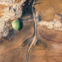 Buy canvas prints of Air balloon landing over grow fields by Pere Sanz