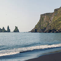 Buy canvas prints of Reynisdrangar Cliffs and sea stacks in Vik, Iceland by Pere Sanz