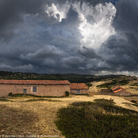 Buy canvas prints of Dramatic Stormy Clouds over Abandoned Rural Houses by Pere Sanz