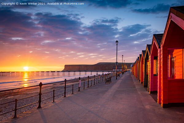 Beach huts at sunrise Picture Board by Kevin Winter