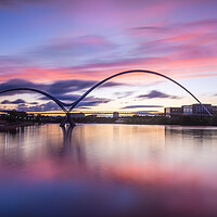 Buy canvas prints of Fiery sunset over the Infinity Bridge by Kevin Winter